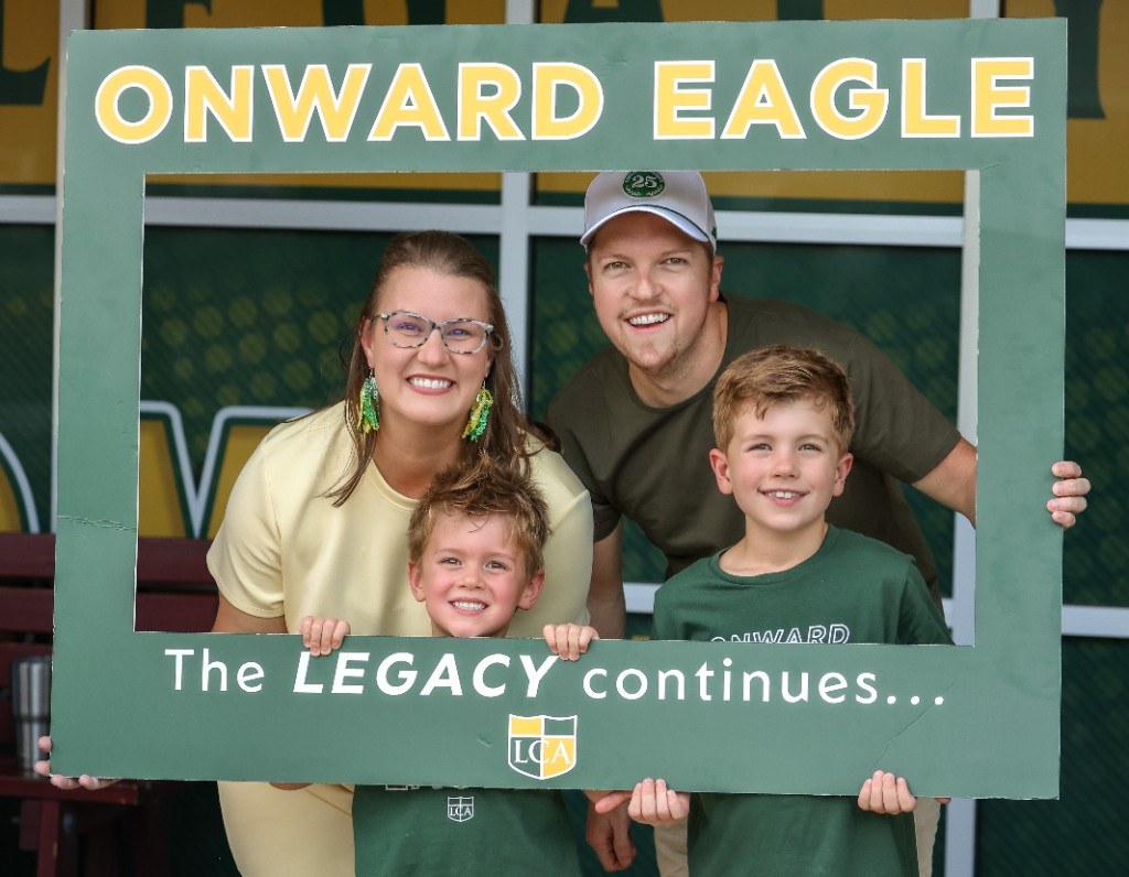 Onward Eagle parents and children with the Legacy continues frame