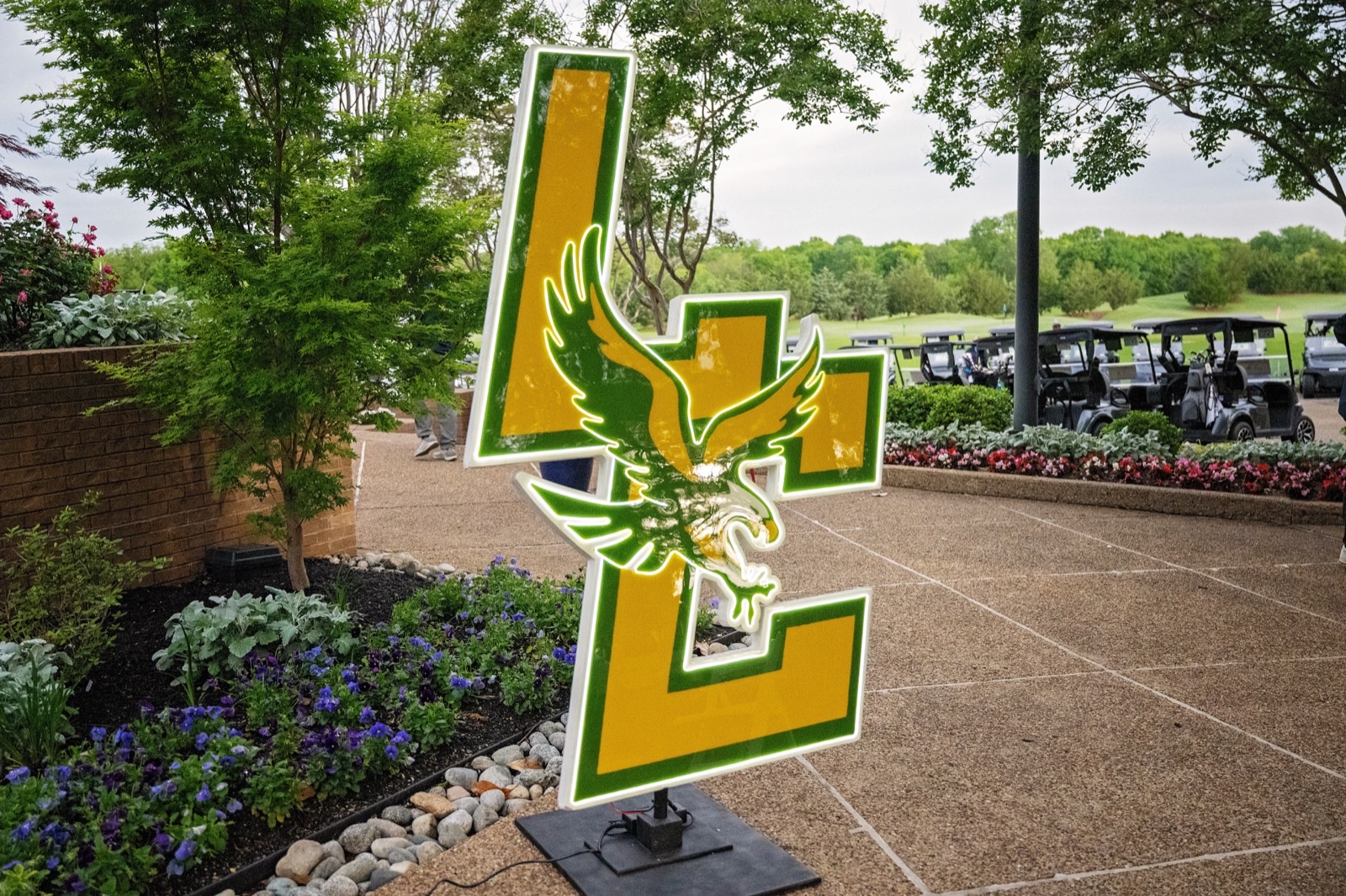 Legacy Christian Academy eagle logo display at the tournament