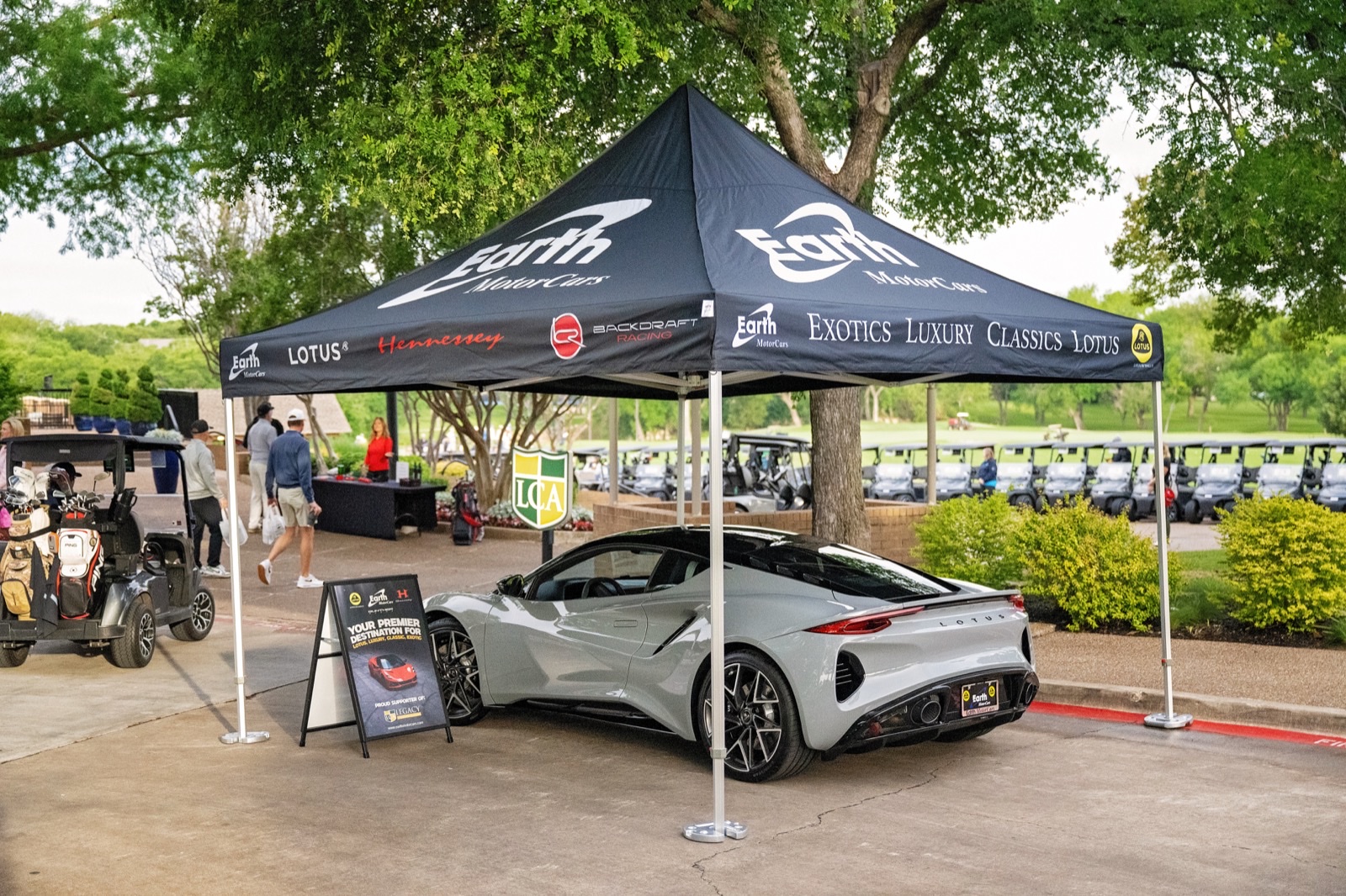 Luxury sports car display at the TJ Tomeny Legacy Classic